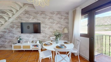 City Apartment | Living area | Flat-screen TV
