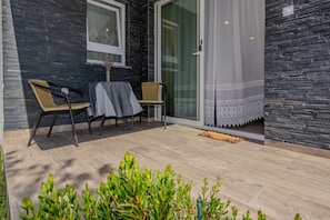 Basic Apartment, Garden View | Terrace/patio