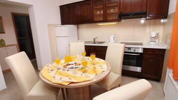 Apartment (One-Bedroom Apartment With Terrace (A) | Private kitchen | Fridge