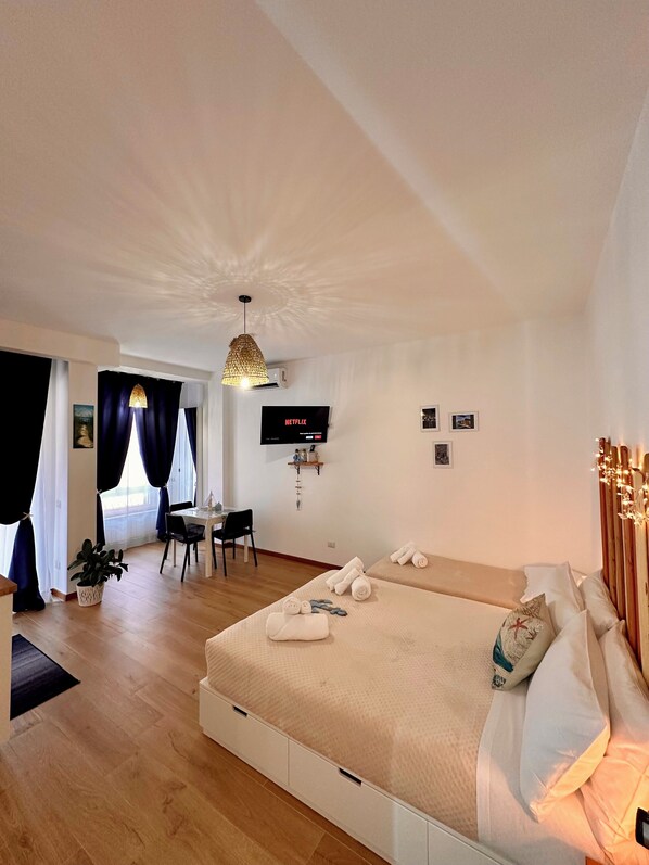 2 habitaciones, tabla de planchar con plancha, wifi y ropa de cama