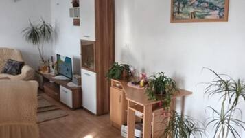 Apartment (Spacious and Cozy Apartments Dugi Rat) | Living room | 32-inch flat-screen TV with cable channels