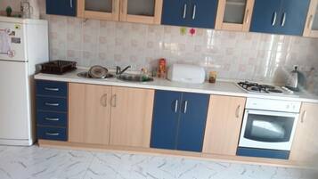 Apartment (Spacious and Cozy Apartments Dugi Rat) | Private kitchen | Fridge