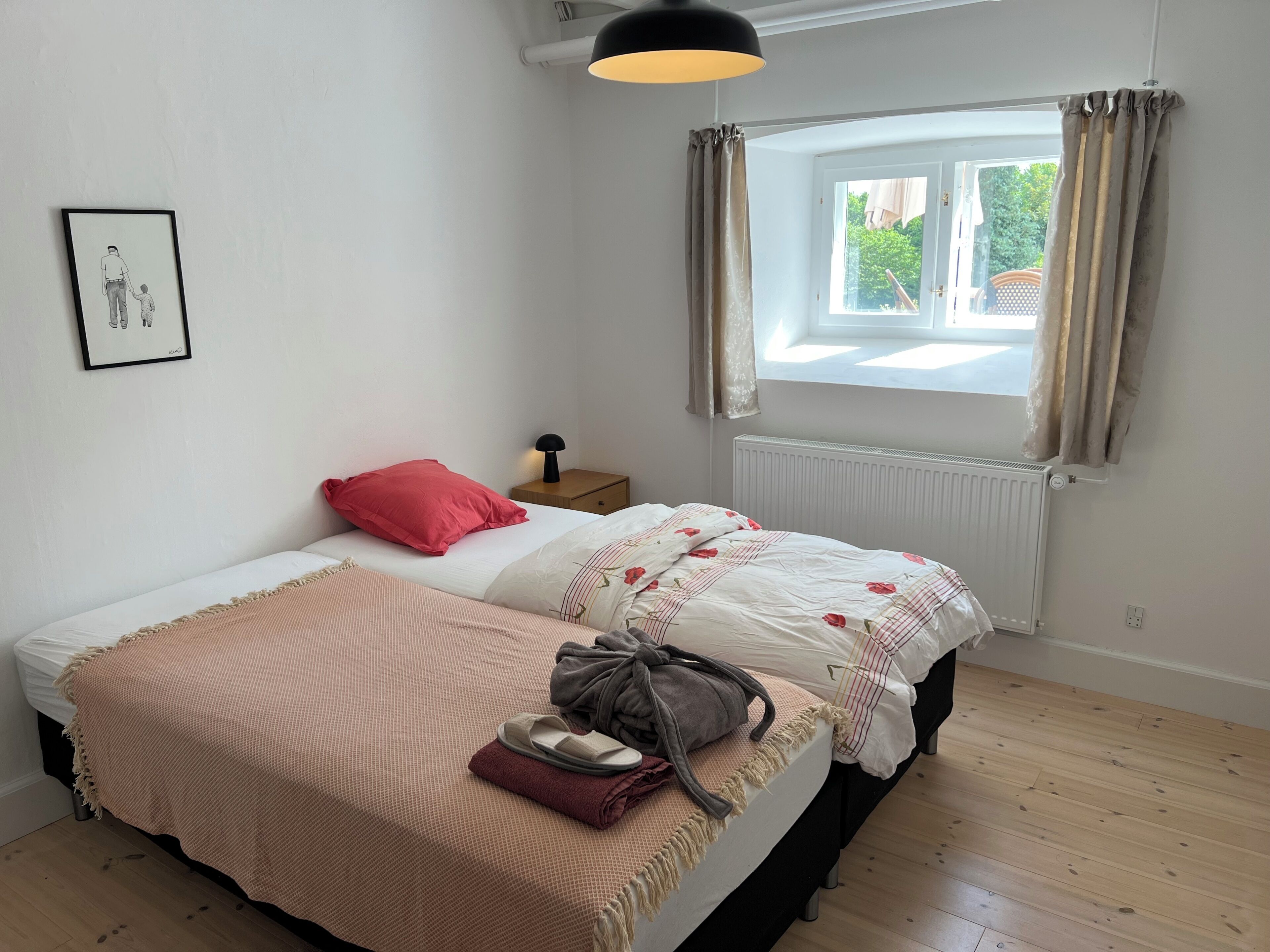 Premium bedding, down comforters, laptop workspace