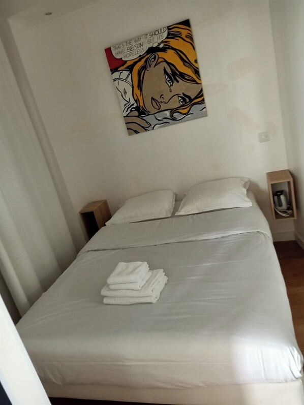 1 bedroom, desk, iron/ironing board, travel crib