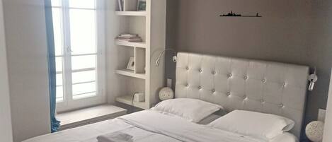 1 bedroom, desk, iron/ironing board, travel cot