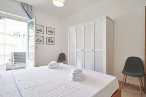 Apartamento (2 Bedrooms) | 2 quartos, ferros/tábuas de passar roupa, berço de viagem, roupa de cama