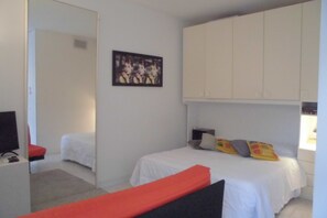 1 bedroom, desk, iron/ironing board, travel cot