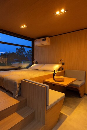 Literie de qualité supérieure, minibar, ameublement personnalisé