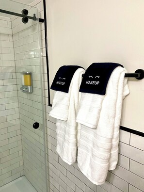 Hair dryer, towels, soap, toilet paper
