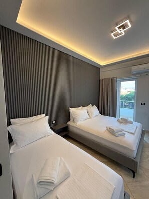 Chambre triple Deluxe | Accès au Wi-Fi (inclus)