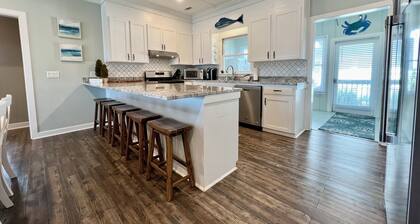 Palmetto Dream is a 4-bedroom 2.5 bath house located on 2nd Row with Great Views