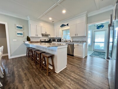 Palmetto Dream is a 4-bedroom 2.5 bath house located on 2nd Row with Great Views