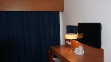 Habitación individual superior, vista a la ciudad | Servicio a la habitación