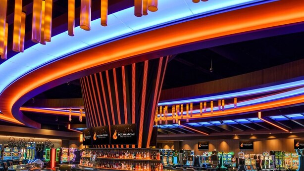 A brightly lit casino interior with slot machines and neon lights. - 4 Bed 1.5 Bath, 3 Story Townhouse, Free Parking (Milwaukee)