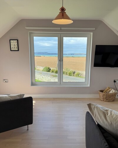 Come for the view, stay for the serenity in this 3 bedroom house near Hook Head!