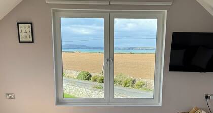 Come for the view, stay for the serenity in this 3 bedroom house near Hook Head!