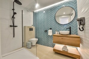 Hair dryer, towels, soap, shampoo