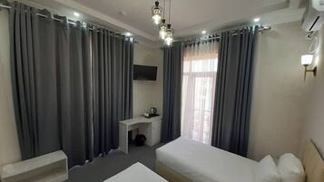 2 chambres, fer et planche à repasser, Wi-Fi, draps fournis