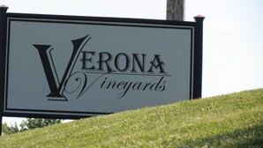 A sign for Verona Vineyards.