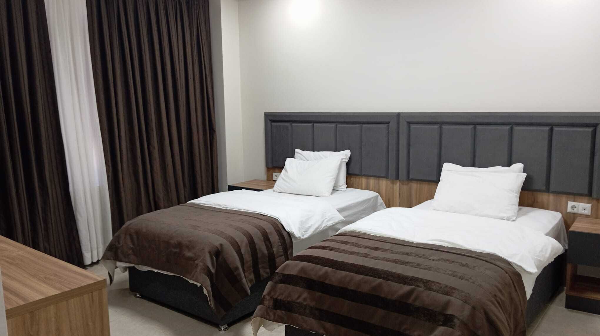 Desk, laptop workspace, blackout curtains, iron/ironing board