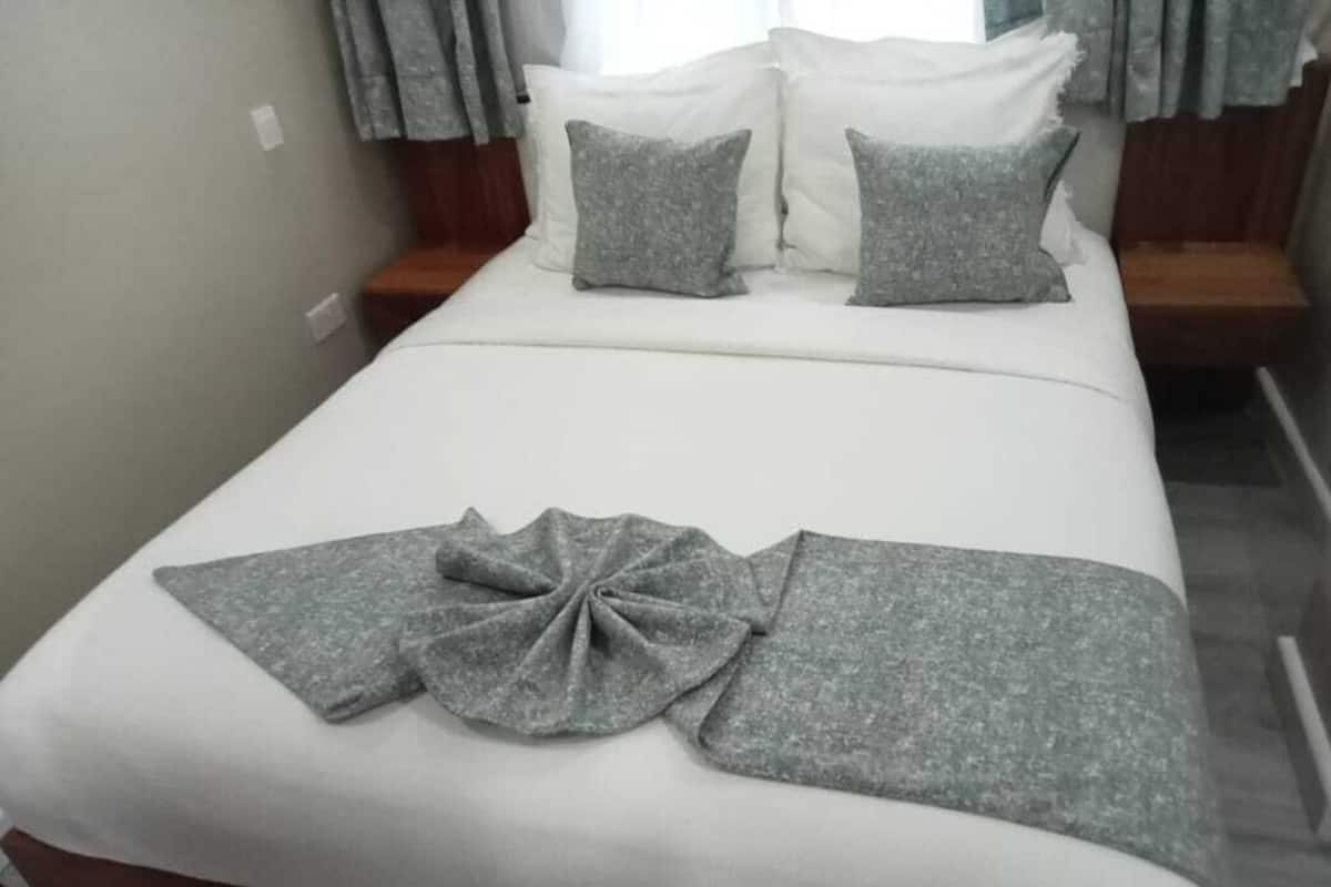 Departamento superior, vista a la ciudad | 2 habitaciones, decoración personalizada y muebles diferentes