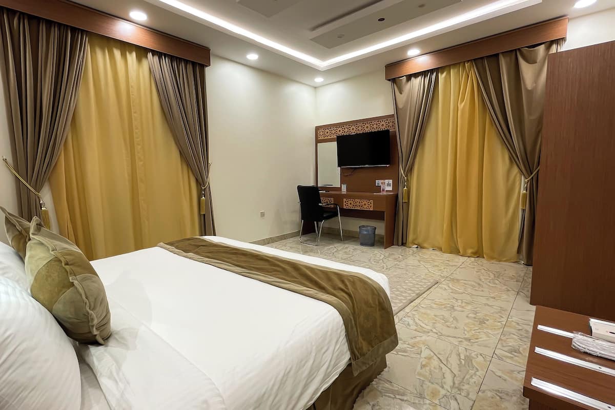 In-room safe, desk, laptop workspace, blackout curtains