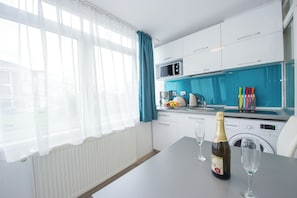 Fridge, microwave, electric kettle, toaster