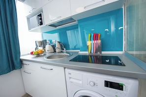Fridge, microwave, electric kettle, toaster