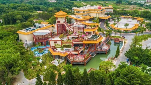 A resort with multiple buildings, a central pool area, and surrounding greenery. - Chaozhou Taian Tang Ruiting Western Suburb Hot Spring Hotel (Chaozhou)