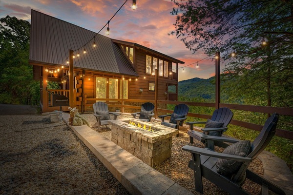 Unwind by the new propane fire pit while soaking in mountain views and fresh air. This outdoor space also features a charcoal grill, perfect for cookouts and roasting marshmallows.