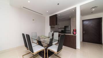 Design Apartment, Non Smoking, Beach View | Dining room