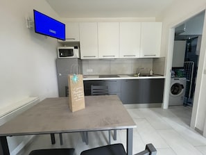 Fridge, microwave, dishwasher, coffee/tea maker