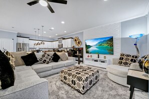 Téléviseur connecté, jeux vidéo, table de ping-pong, livres