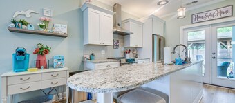 The Mermaid Cottage! Centrally located, pool, and loaded with extras!