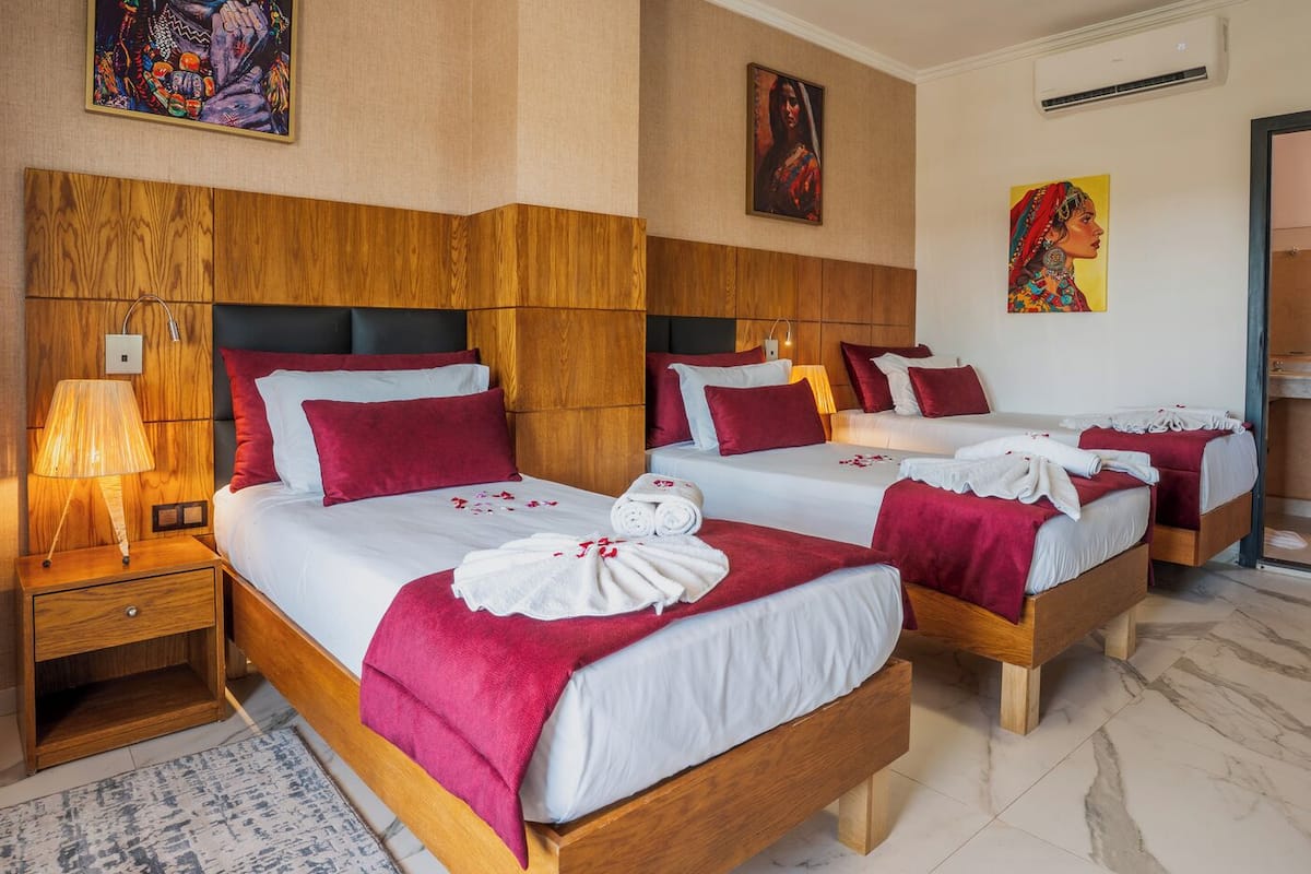 Triple Room, Pool View | 1 bedroom, premium bedding, down comforters, minibar