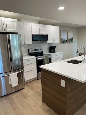 Fridge, microwave, oven, stovetop - The Suite on Paradise Hill, fully furnished basement suite (Prince George)
