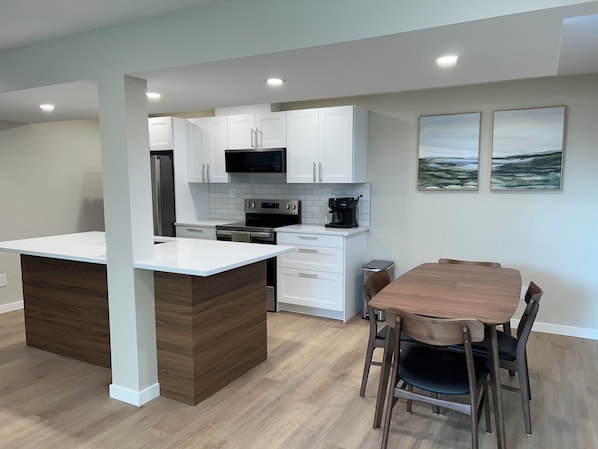 Fridge, microwave, oven, stovetop - The Suite on Paradise Hill, fully furnished basement suite (Prince George)