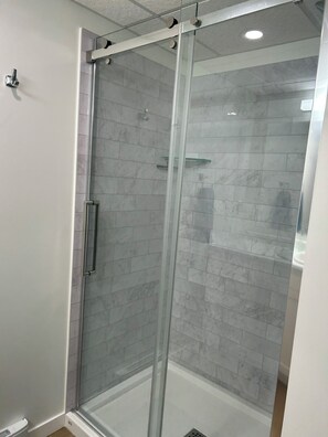 Shower, hair dryer, towels, toilet paper - The Suite on Paradise Hill, fully furnished basement suite (Prince George)