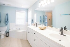 Shower, jetted tub, hair dryer, towels