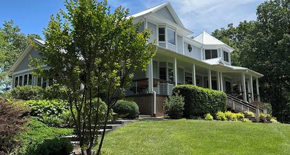 Mountain View’s, dual water fall Koi pond and private theater.