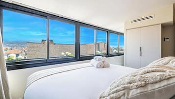 2 habitaciones, tabla de planchar con plancha, wifi y ropa de cama