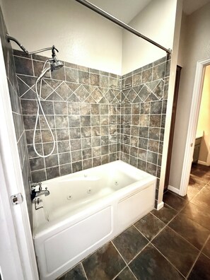 Shower, towels, soap, toilet paper