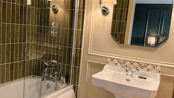 Family Suite, Multiple Beds, Garden View | Bathroom | Combined shower/bathtub, hair dryer, towels, soap