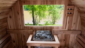 A wooden sauna with a window providing a view of trees. - Bourbon Trail*River Views*Hot Tub*Sauna*EVSE*WiFi (Frankfort)