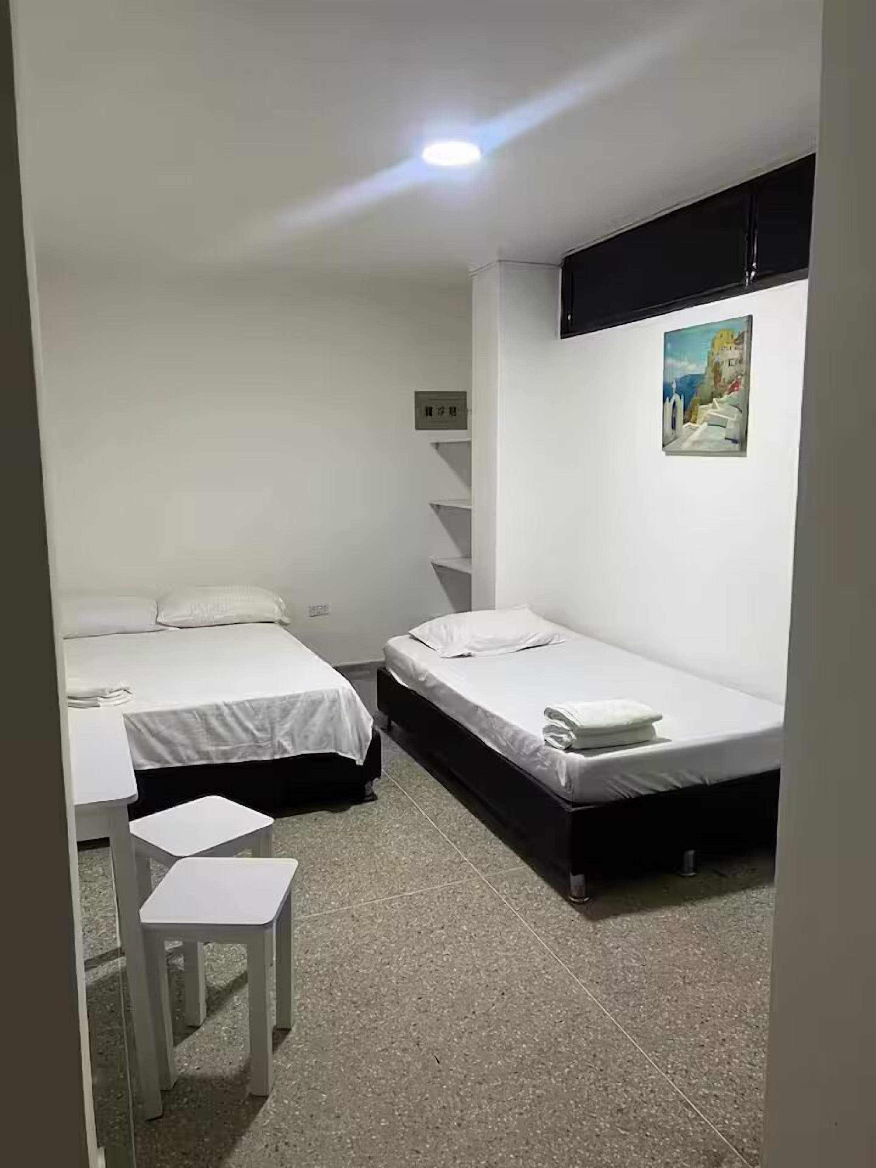 Chambre Double Confort | Salle de bain | Serviettes fournies, savon, papier toilette