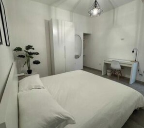 1 bedroom, desk, iron/ironing board, travel cot