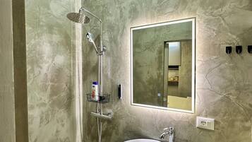 Shower, free toiletries, hair dryer, slippers