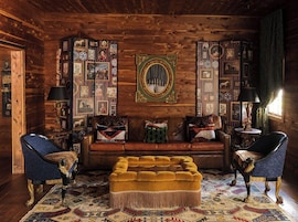 Luxury Suite | Living area | Flat-screen TV, streaming services