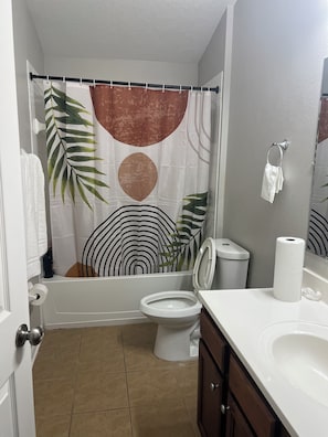 Hair dryer, towels, soap, shampoo