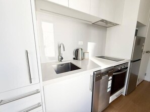Deluxe Apartment, Balcony, City View | Private kitchen - Central Haven Studio on Queen Street  (Auckland)